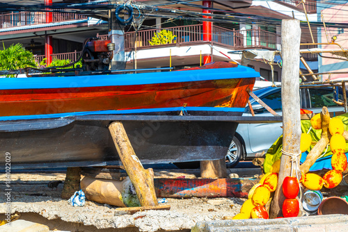 Wallpaper Mural Fisher boat boats on the beach sand on Phuket Thailand. Torontodigital.ca