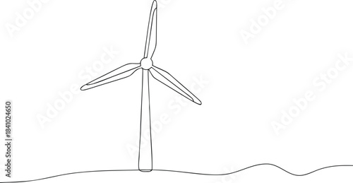 Wind turbine with three blades on a hill landscape