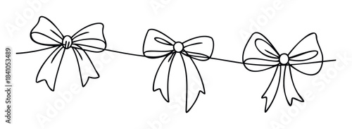 Festive garland with three black bows on a thin string, perfect for holiday decorations, gift wrapping, and celebration themes.