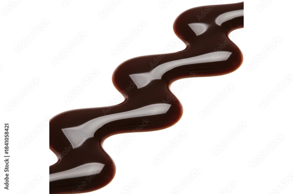 Obraz premium Zigzag drizzle of dark chocolate sauce isolated on a transparent background