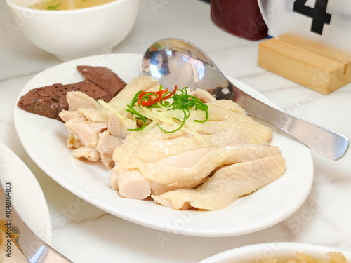 Chicken boiled sliced in a white dish. High protein. Delicious food.