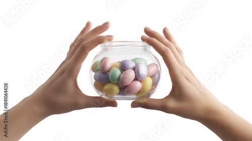 Hands holding a glass jar filled with pastel colored easter eggs isolated on transparent background
