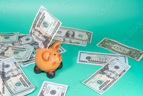 A piggy bank overflowing with cash, symbolizing financial concepts like savings and economic prosperity, set against an illustrative background.