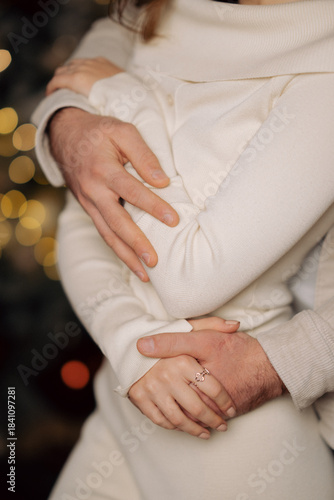 Tender Embrace with Intertwined Hands