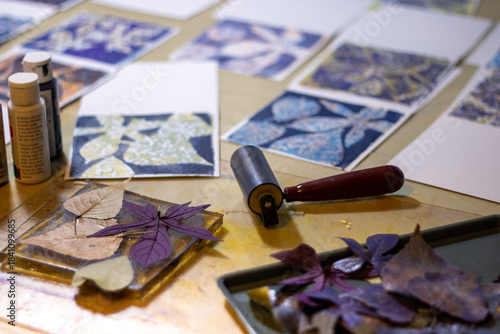 Autumn leaves arranged on gelli plate for botanical printmaking