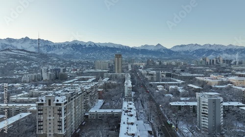 A drone view of the central part of the Kazakh city of Almaty before sunrise on a winter morning.