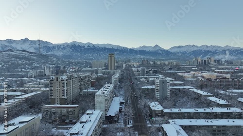 A drone view of the central part of the Kazakh city of Almaty before sunrise on a winter morning.