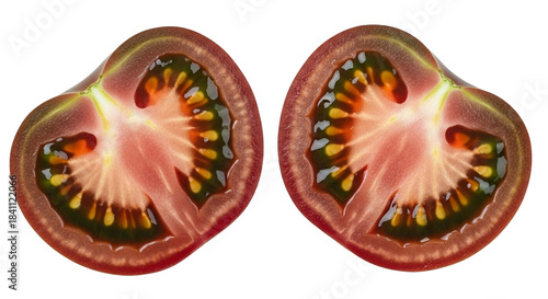 Two halves of a ripe heirloom tomato showing internal structure and seeds isolated on a transparent background