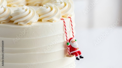 Whimsical Santa figurine riding candy cane swing on tall white buttercream cake with piped rosettes, charming playful Christmas dessert design perfect for joyful family gatherings and kids holiday par