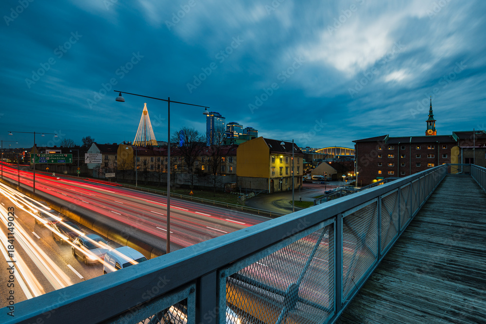 Fototapeta premium Light trails from vehicles on motorway in Gothenburg during the evening time