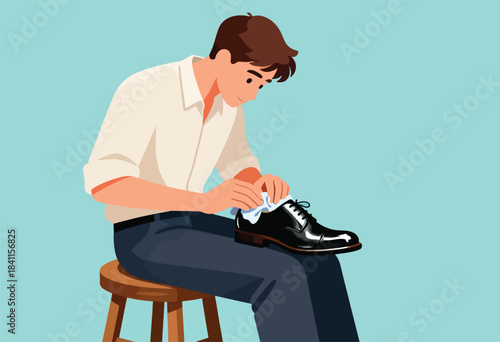A person seated polishing a black dress shoe with a cloth. The scene has a soft color palette