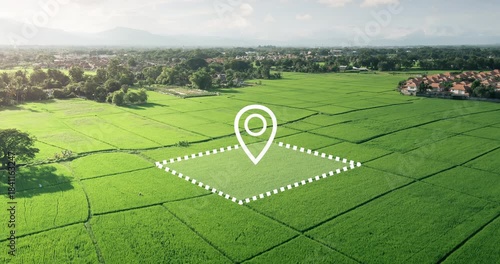 Land parcel with digital pin in aerial view, showcases plot of land for sale, its boundaries marked with precision, overlaid by digital pin indicating the exact location, representing property.