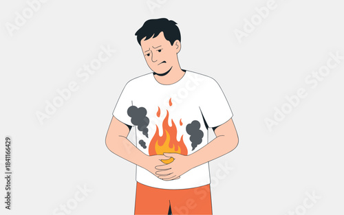 Man with stomach pain wearing a shirt with fire and smoke