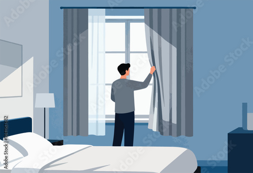 A person in a blue-toned bedroom pulls back a curtain, light streams through the window