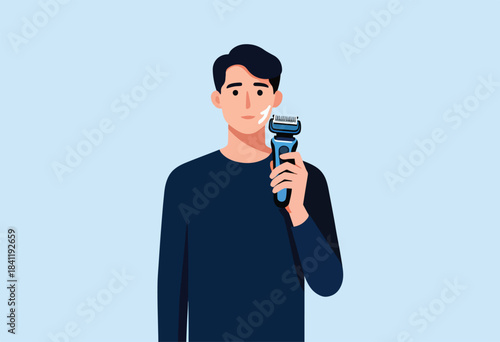 A man shaves his face with an electric razor, a smear of shaving cream is visible. Blue background