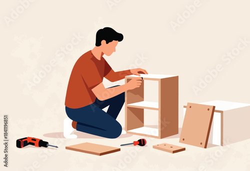 A person assembling a wooden cabinet with tools and parts scattered nearby. Kneeling, they attach a piece