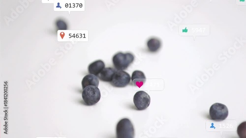 Blueberries shifting and rolling, notification badges appearing, floating to show rising engagement