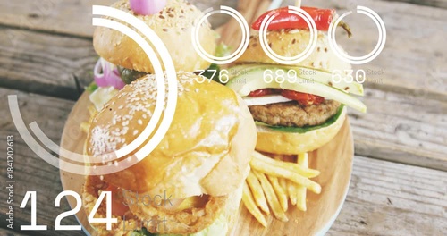 Overlay appearing, rings growing and spinning, counters rising, falling, showing metrics on burgers