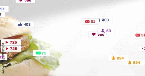 Mouse cursor entering frame, badges swarming and overlapping, then dispersing, revealing sandwich