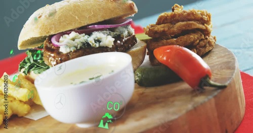 Camera pulling back, revealing burger meal while green eco icons floating, showing sustainability