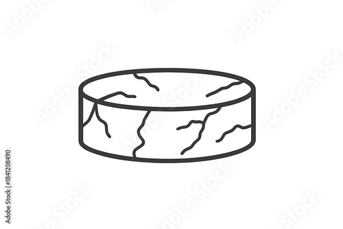 Round object with cracks and lines on a plain background showing texture and structure in a simple design