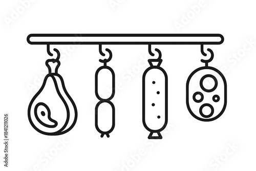 Hanging meats and sausages in a butcher shop at a market during midday in a town