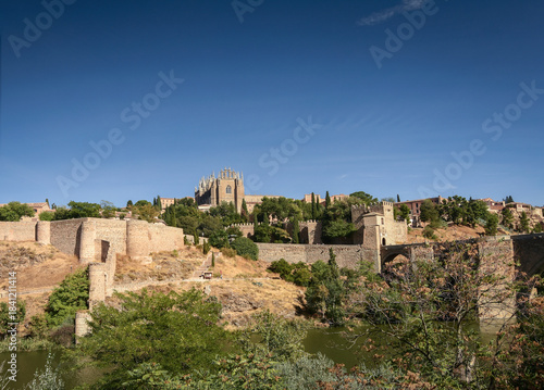 san martin bridge on tagus river in old town toledo spain