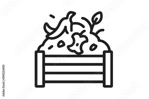 Sustainable gardening practice using wooden composting bin filled with organic food scraps