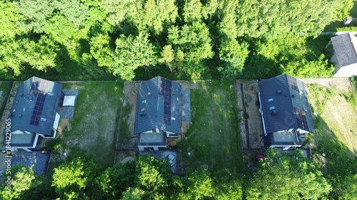 Village homes near large solar panel field