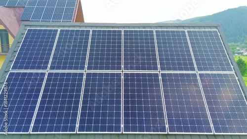 Village homes near large solar panel field