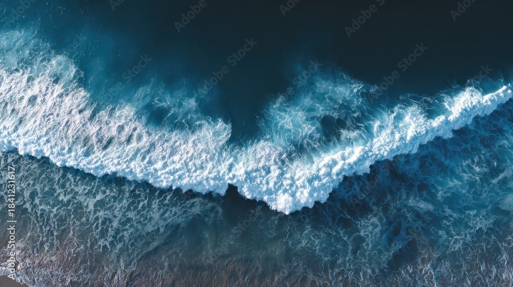 Fototapeta premium Dramatic ocean surface showing tide-driven wave interaction and white foam