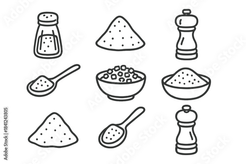 Minimalist black and white kitchen spices, salt shakers, pepper mills, and measuring spoons