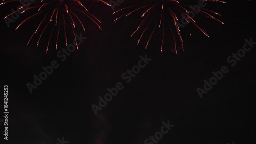 Amazing real beautiful colorful fireworks background on celebration night event for happy new year party, Abstract Multi color golden firework in the night sky