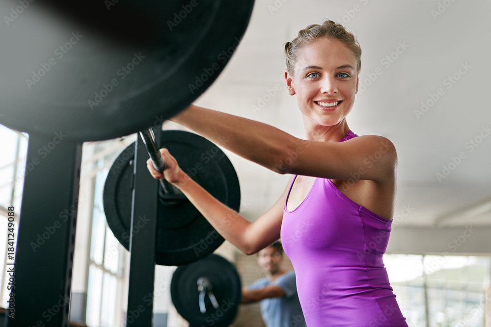 Obraz premium Happy woman, portrait and weightlifting with barbell in gym for workout, exercise or strength. Active, female person or smile with bench weight or equipment for muscle gain or training in health club