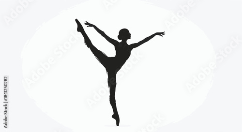 Graceful ballerina performs elegant dance pose against a clean white backdrop