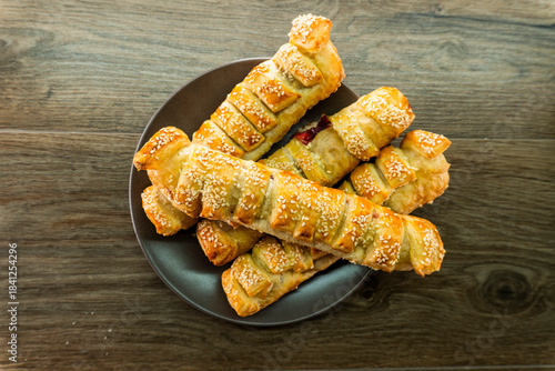 Puff pastry with strawberry jam. Jam-filled pastries. Food concept.