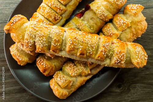 Puff pastry with strawberry jam. Jam-filled pastries. Food concept.