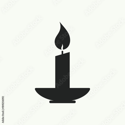 Candle flame illuminating subtle ambiance, representing tranquility and warmth. Ideal for concepts of relaxation, meditation, or home decor.