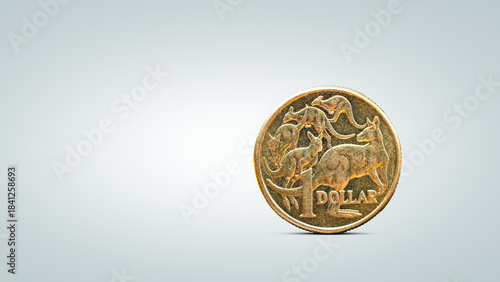 Australian One Dollar Coin on Neutral Background with Copy Space