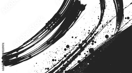 Abstract black ink brush strokes and splatters on a white background, evoking a sense of dynamic movement and artistic expression.