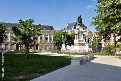 Park with fountain in the city center of Belfort in spring, France