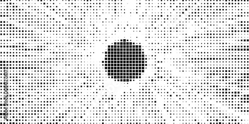 Abstract pixelated explosion effect with scattered black and gray squares on a white background