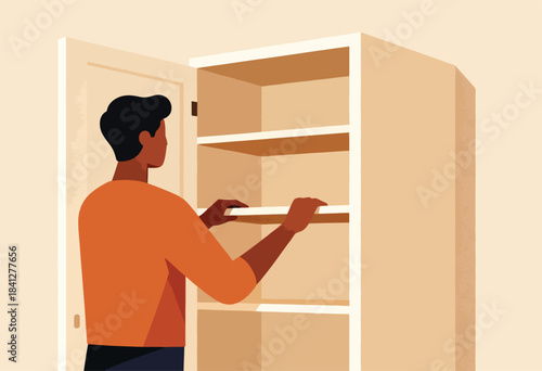 Person opens an empty shelving unit