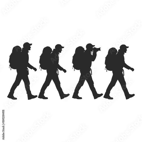 Silhouettes of hikers walking in a line carrying backpacks and equipment