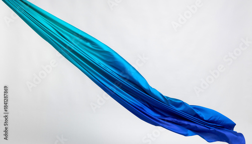 Abstract flowing blue wave background with smooth translucent curves, fluid motion lines, soft gradients, and elegant modern design on a clean white backdrop