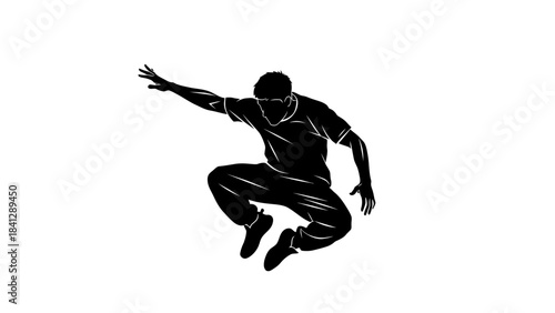 Silhouette of a young man performing a dynamic parkour jump in mid air showcasing athleticism and urban movement