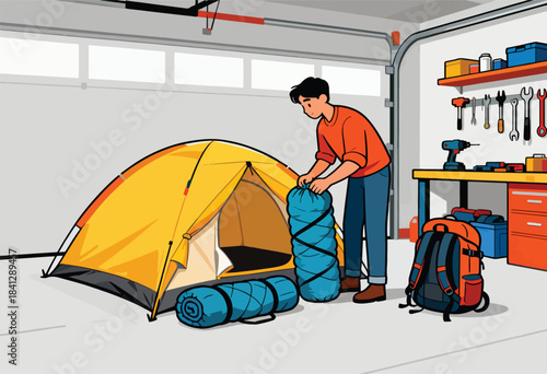 A person packs camping gear in a garage