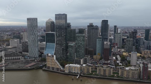 Wallpaper Mural Aerial drone view of Canary Wharf in London, showcasing its modern skyscrapers, multinational headquarters, financial institutions, and the iconic skyline of one of Europe’s major business districts. Torontodigital.ca
