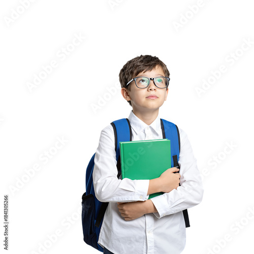 Young schoolboy wearing glasses holding a green book