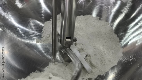 How to mix dry ingredients for baking in a mixing bowl at the bakery